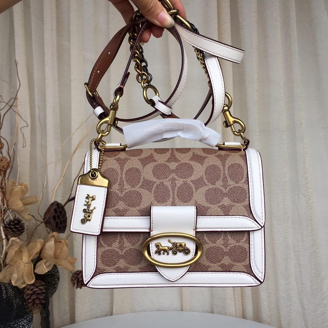 coach riley top handle 18 in signature canvas