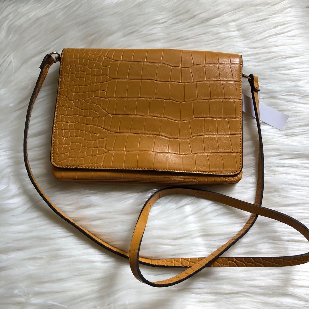 H M MUSTARD SLING BAG