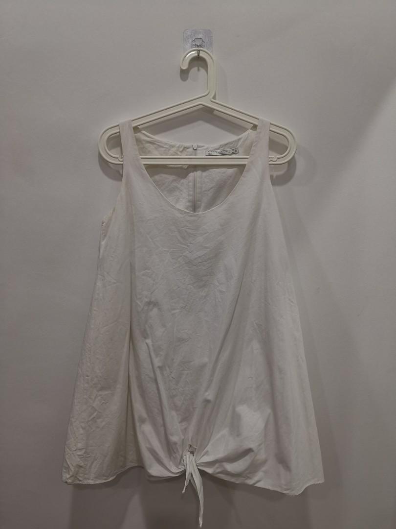 white sleeveless romper