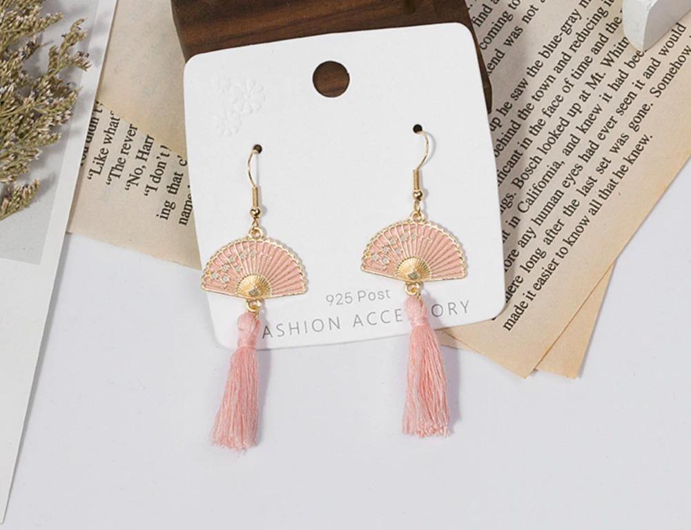 White fan sales tassel earrings