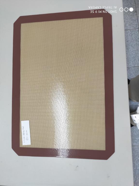 Nonstick Silicone Baking Mat Brown (Category: Bakeware) located in Manila. Submitted by ryuquico (Listing ID 1062034626, Image 1). Description: Our Silicone Baking Mats are designed for the baking pad for bakery and sugarcraft. It consists of glass fabric and food safe silicone Non stick Easy Release Flexible mat makes clean-up easy Safe for food contact Size 29.5cm x 42cm.