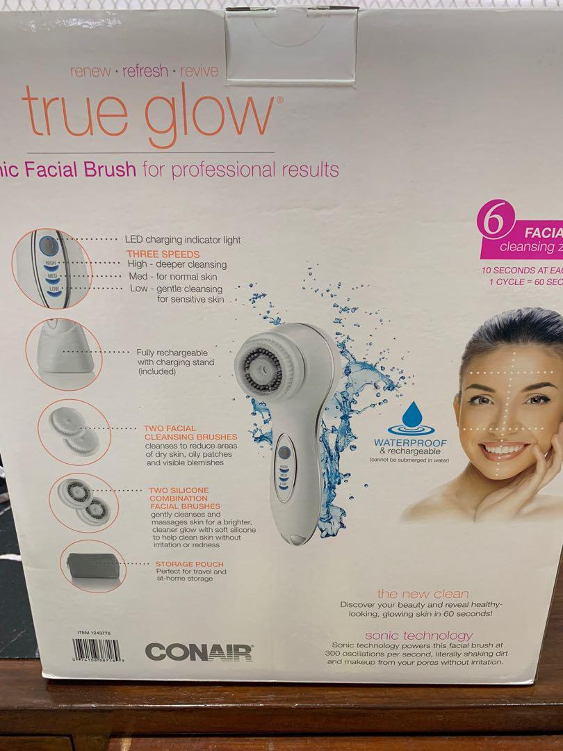 CONAIR True Glow sonic facial brush (Category: Face Care) located in Muntinlupa City. Submitted by goblinsbrideph (Listing ID 1062204502, Image 2). Description: BNIB Conair Sonic Facial Brush is clinically proven, dermatologist tested. Set includes: * Sonic Brush Handle * 4 Facial Cleansing Brush Heads – 2 Facial Brush Heads and 2 Silicone Combination Exfoliating Brush Heads * Charging Stand * Storage Pouch More features: * Sonic vibration * Wate