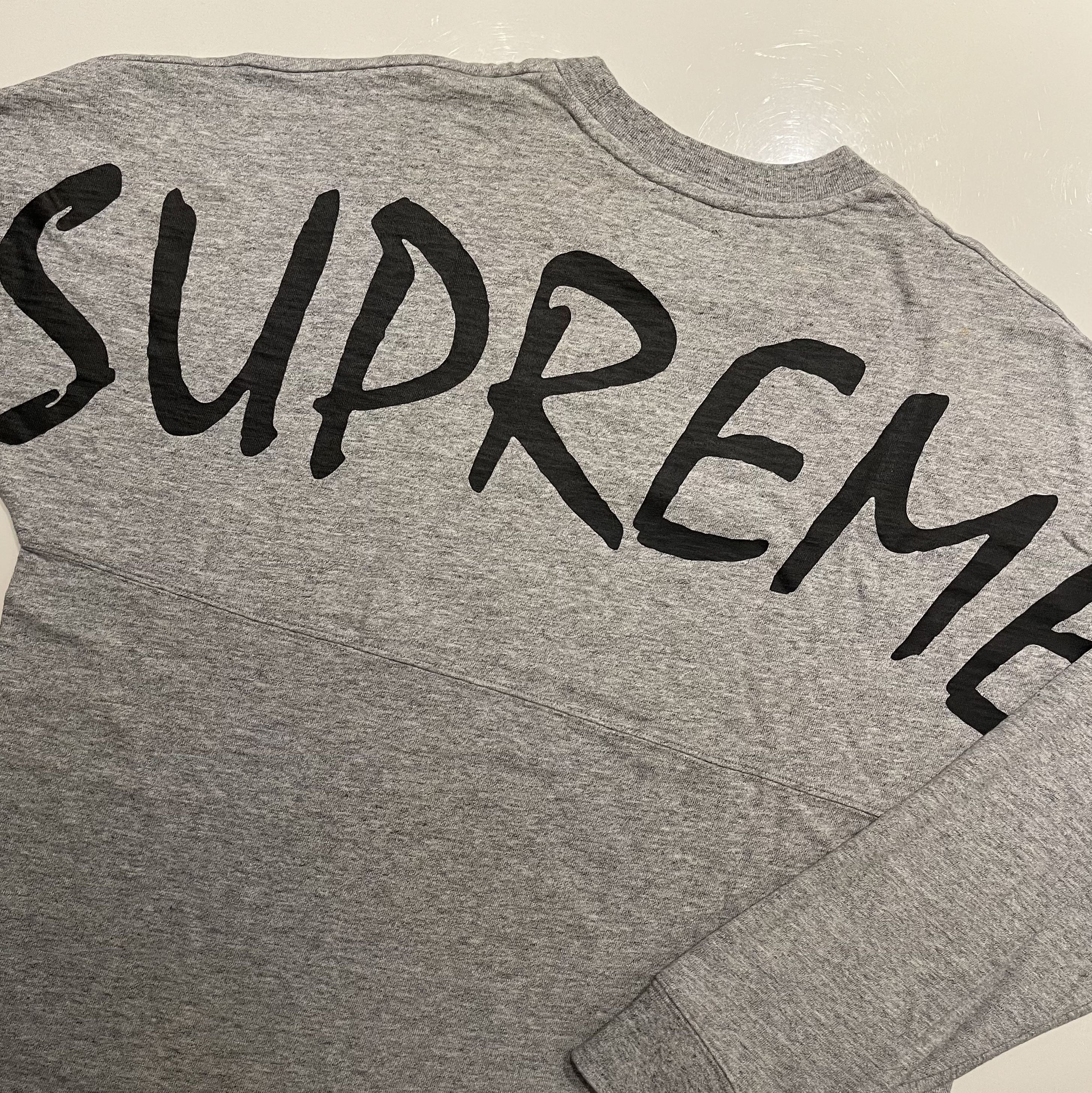 Supreme arena top outlet