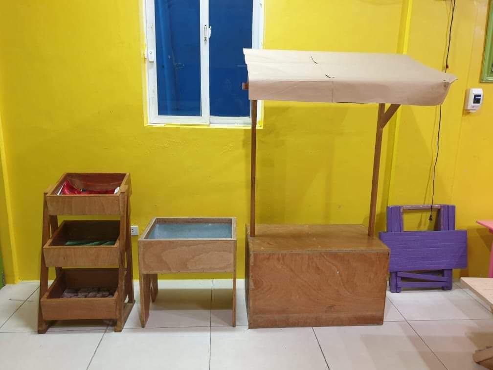 Wooden Kiosk Play Area (Category: Other Kids Furniture) located in Pasig City. Submitted by iammivm (Listing ID 1059851531, Image 1). Description: Wooden Kiosk Play Area - 1000 Height 62” Length 32” Width of the roof 23” Width of the body 18” Wooden Sand Play Area- SOLD Wooden Food Stand Play Area- SOLD.