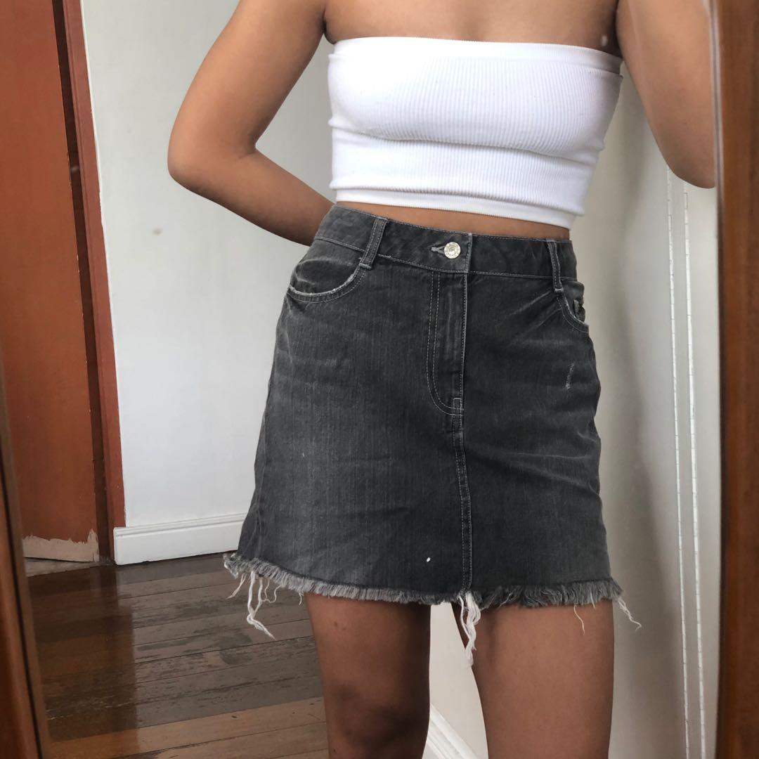 Bershka Grey Denim Skirt (Category: Skirts) located in Quezon City. Submitted by mccev (Listing ID 1062411558, Image 1). Description: Perfect condition Best fits waistline 28-30 Distressed denim style Washed Height reference: 5’3.