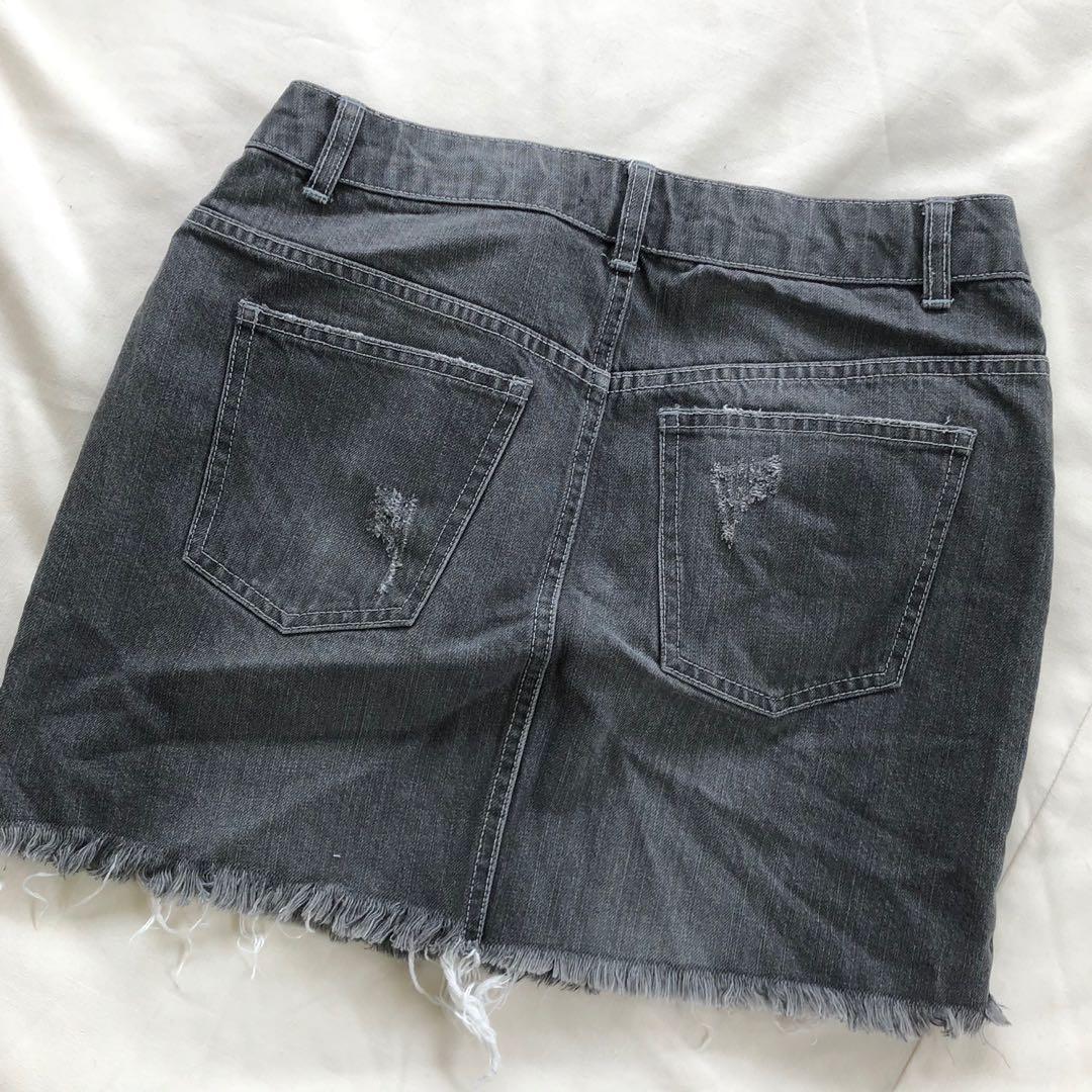 Bershka Grey Denim Skirt (Category: Skirts) located in Quezon City. Submitted by mccev (Listing ID 1062411558, Image 3). Description: Perfect condition Best fits waistline 28-30 Distressed denim style Washed Height reference: 5’3.