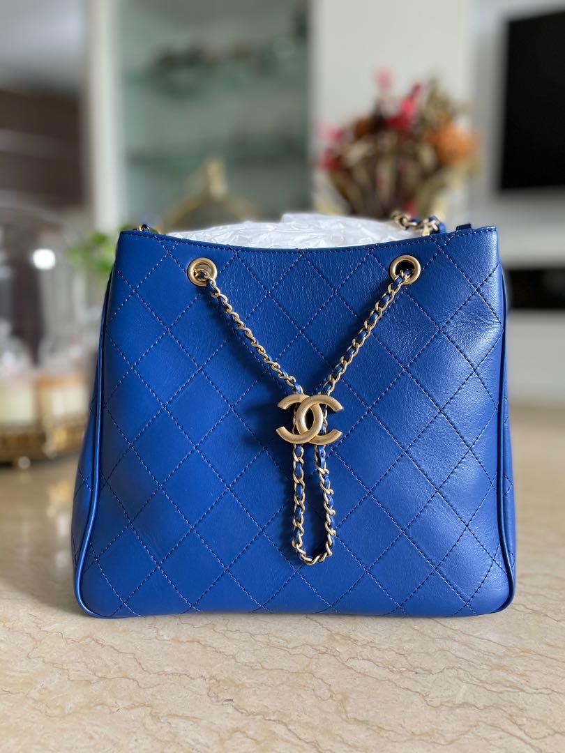 Chanel Drawstring Bucket Bag with Charms, Luxury, Bags & Wallets on