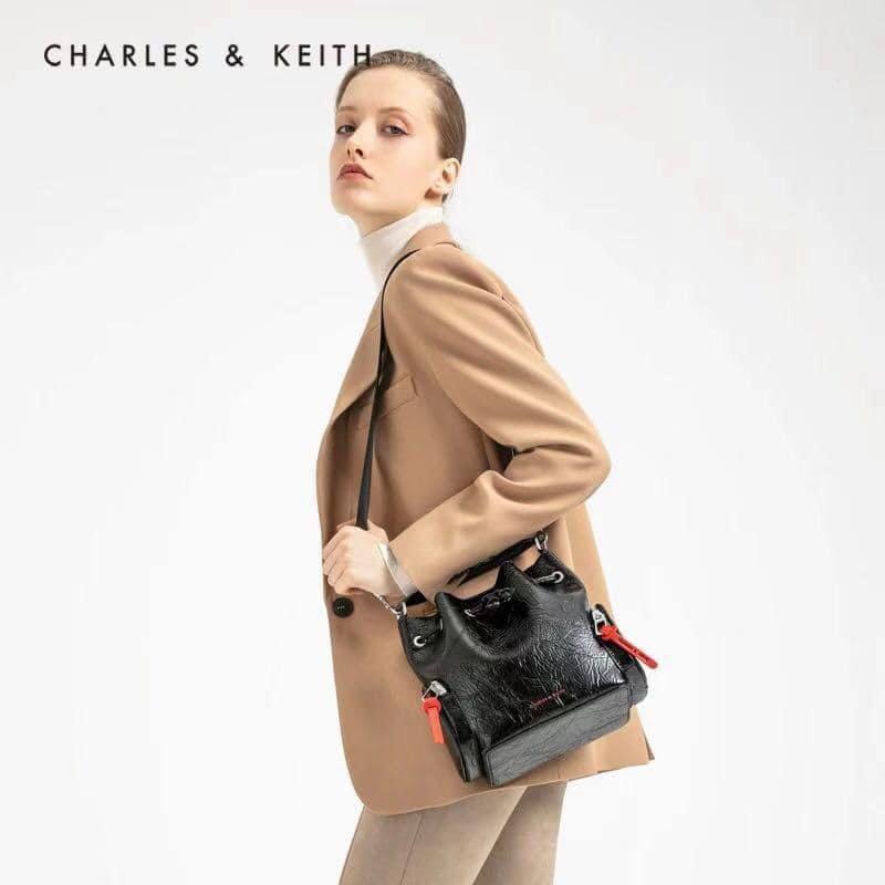 Charles and Keith Wrinkled Effect Drawstring Bucket Bag Women s Fashion Bags Wallets Cross body Bags on Carousell