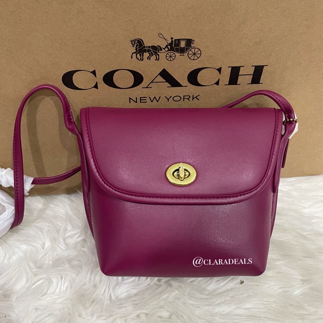 coach large turnlock pouch