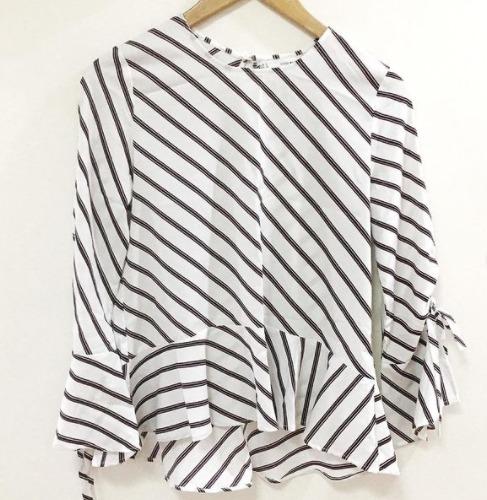 Sfera Blouse with Diagonal Stripes and peplum design (Category: Blouses) located in Angeles City. Submitted by goodeeph (Listing ID 1062761660, Image 1). Description: SFERA basic blouse with diagonal stripes and peplum design —Size: Small —Original and 10/10 condition RFS: Decluttering Shipping via J&T (SF to be shouldered by Buyer) Mode of Payment: BPI or GCash *No return; no exchange. *Disclaimer: GoodeePh is not affiliated with the brand poste