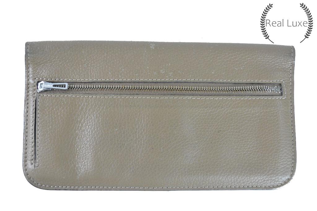 Authentic HERMES dogon recto wallet (Category: Luxury Bags & Wallets) located in Cagayan de Oro. Submitted by real_luxe (Listing ID 1062977445, Image 3). Description: FLAW: Broken zipper Riri zipper Stamp/code is barely noticeable No Inclusion ( Encircled ones are the flaws of the item ) The Photos are taken by "US" and water mark on all images to avoid people taking our hard work. We take a lot of photos already with good quality, so hoping you 