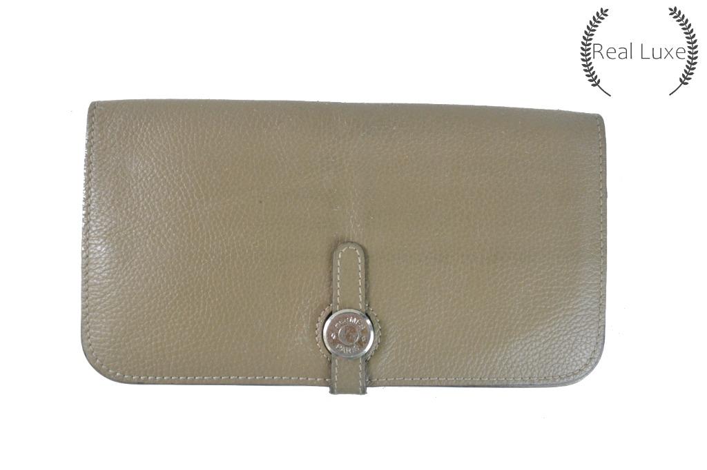 Authentic HERMES dogon recto wallet (Category: Luxury Bags & Wallets) located in Cagayan de Oro. Submitted by real_luxe (Listing ID 1062977445, Image 1). Description: FLAW: Broken zipper Riri zipper Stamp/code is barely noticeable No Inclusion ( Encircled ones are the flaws of the item ) The Photos are taken by "US" and water mark on all images to avoid people taking our hard work. We take a lot of photos already with good quality, so hoping you 