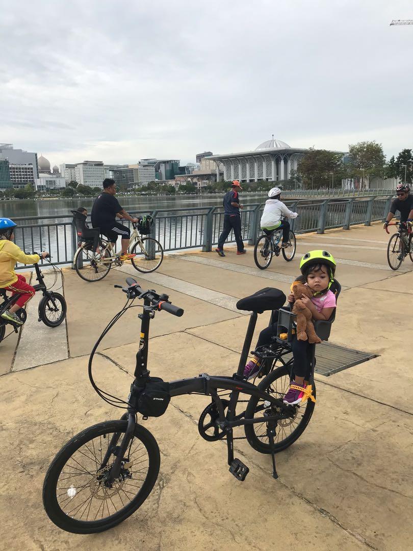 Folding bike store baby carrier