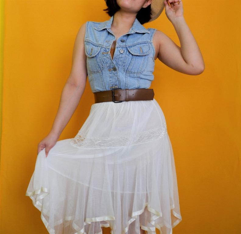 [BUNDLE] Denim Vest and Lace Skirt (Category: Skirts) located in Antipolo. Submitted by clutteredge (Listing ID 1062919936, Image 2). Description: Style: Kinda feels a bit country. A heavy denim vest that you can wear in different ways and a flowy, lacy skirt to fit a cute and adorable look. Size: S-M.