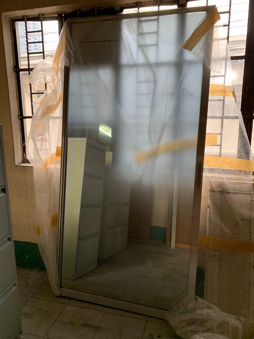 FROSTED GLASS SLIDING DOOR (Category: Locks, Doors & Gates) located in Quezon City. Submitted by xlgkx (Listing ID 1063102006, Image 2). Description: Stainless steel edging and handle No scratches Very good condition I have 2 of this Dimensions: 2.07M height 1.03M width.
