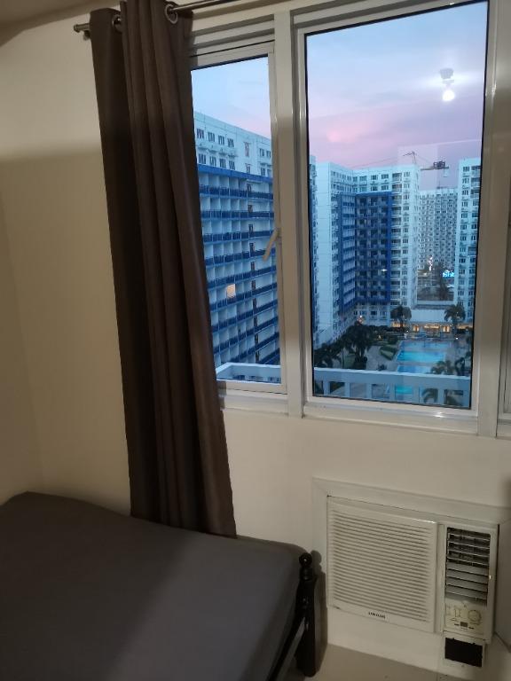 Furnished Condo in MOA Pasay (Category: Apartments & Condos) located in Manila. Submitted by erwinfrancisco (Listing ID 1063021683, Image 3). Description: Fully furnished condo unit with 24 sq. m. floor area, 11th floor with view of swimming pools. This unit is equipped with aircon, cooking unit with range hood, refrigerator, shower heater, automatic washing machine, microwave and TV. 2mos security deposit, 1mo advance. Rent inclusive of Associat
