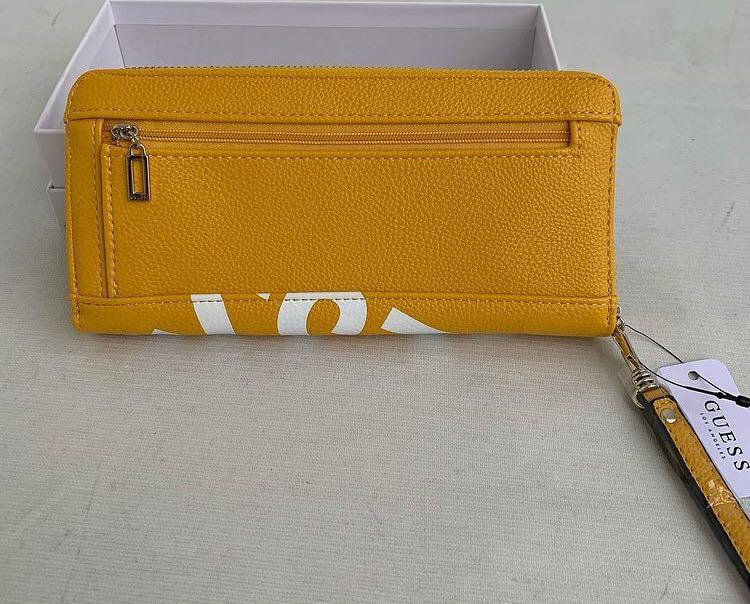 GUESS WALLET YELLOW ORIGINAL, Fesyen Wanita, Tas & Dompet di Carousell