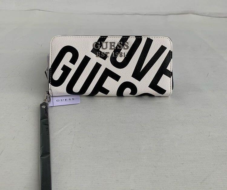 GUESS WALLET YELLOW ORIGINAL, Fesyen Wanita, Tas & Dompet di Carousell