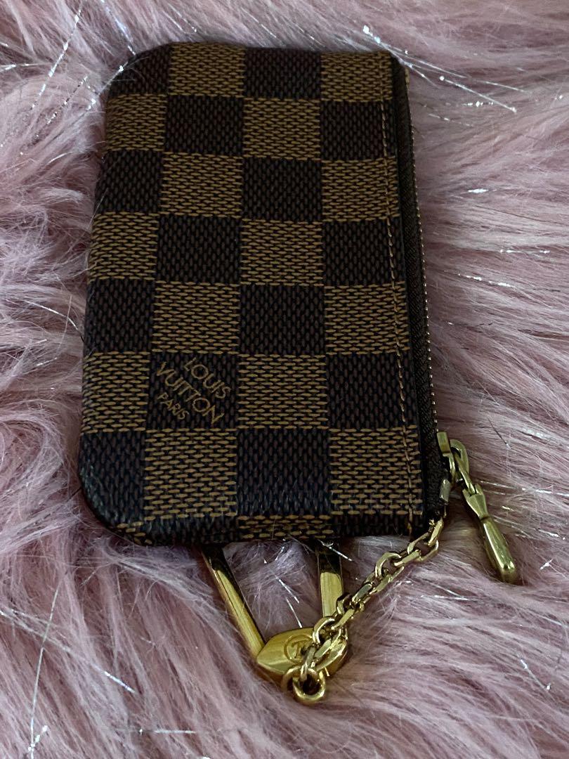 Louis Vuitton Damier Ebene Key Holder Pouch (Category: Luxury Bags & Wallets) located in Marikina City. Submitted by neltan_carousel (Listing ID 1063078182, Image 2). Description: LV Damier Ebene Key Holder Pouch ~ 💯% Authentic/Original ~ Slightly used (no flaws) - 9.5/10 ~ with provided original LV box.
