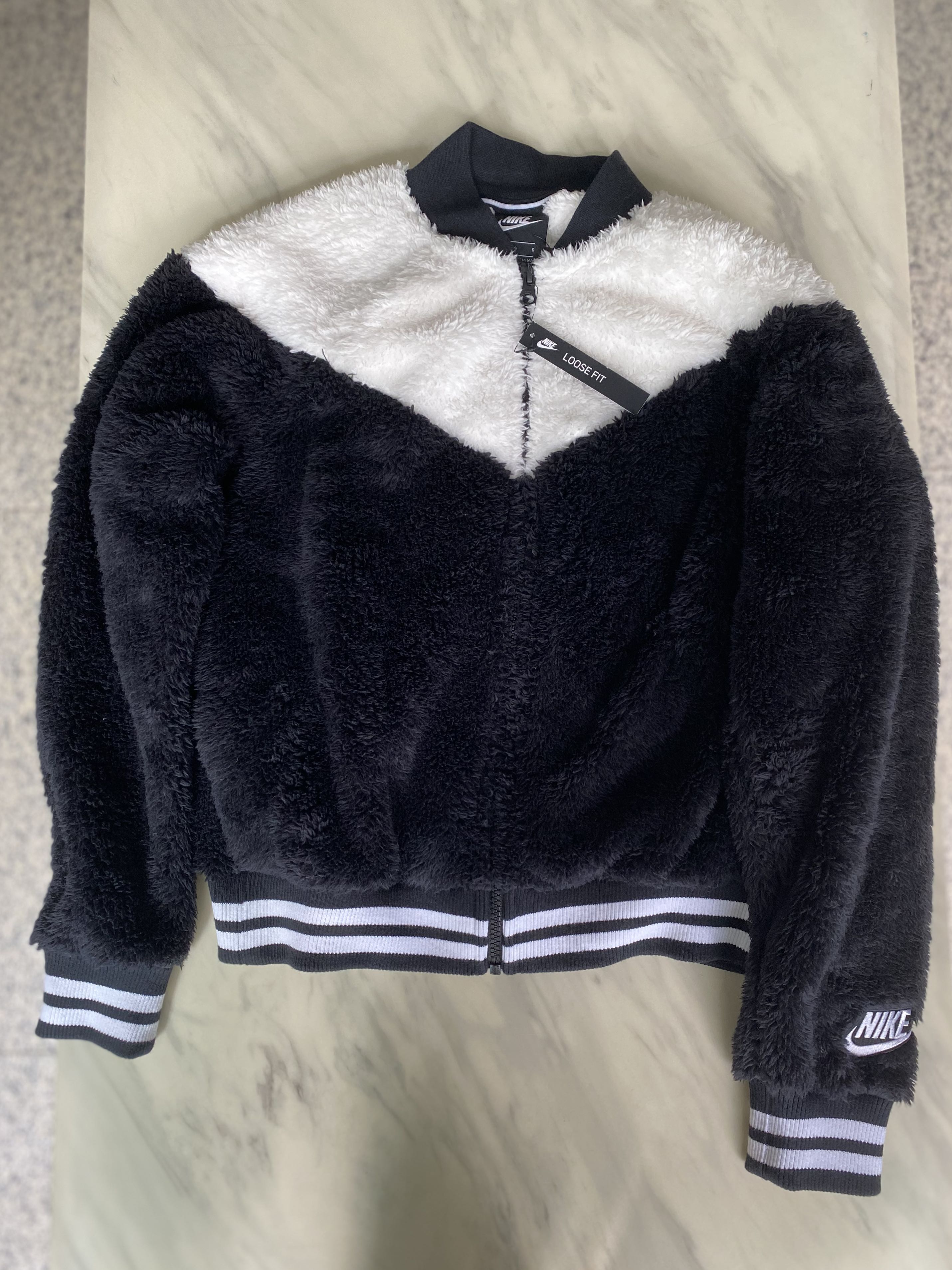 black fuzzy nike jacket