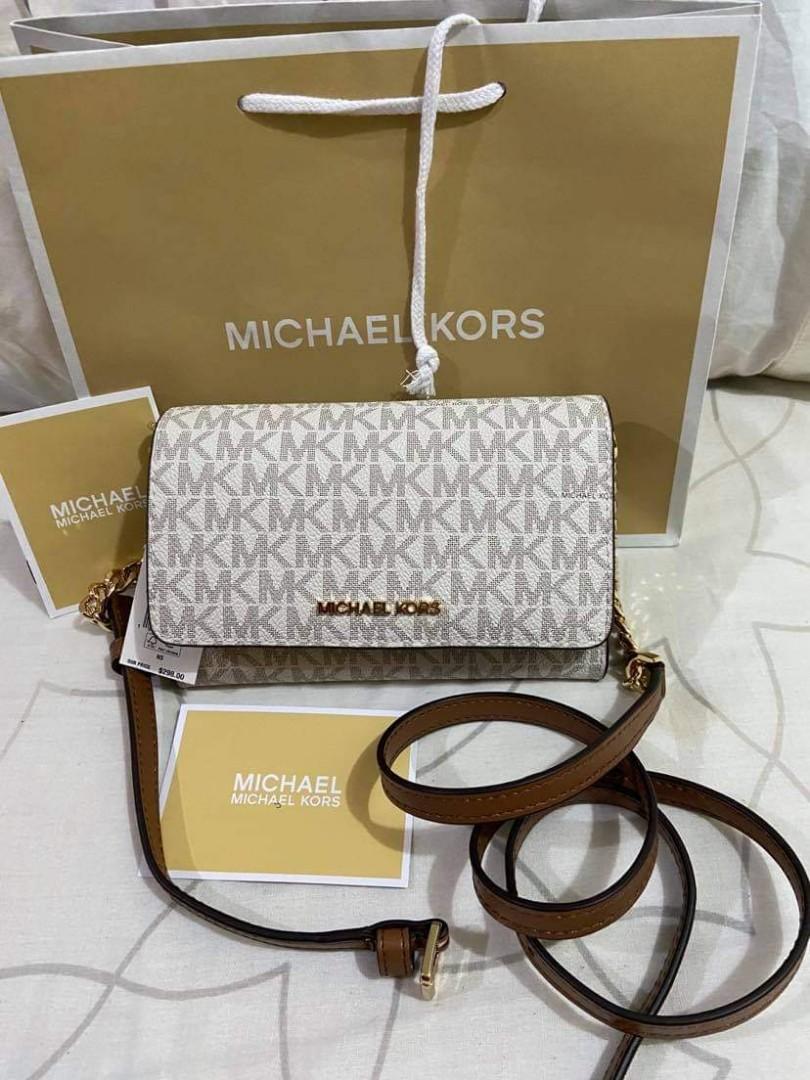 Original Michael Kors Sling wallet, Women's Fashion, Bags