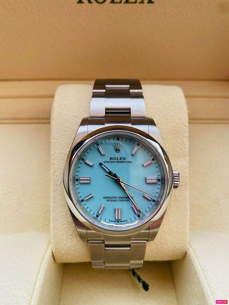rolex oyster perpetual 41mm 124300 turquoise blue