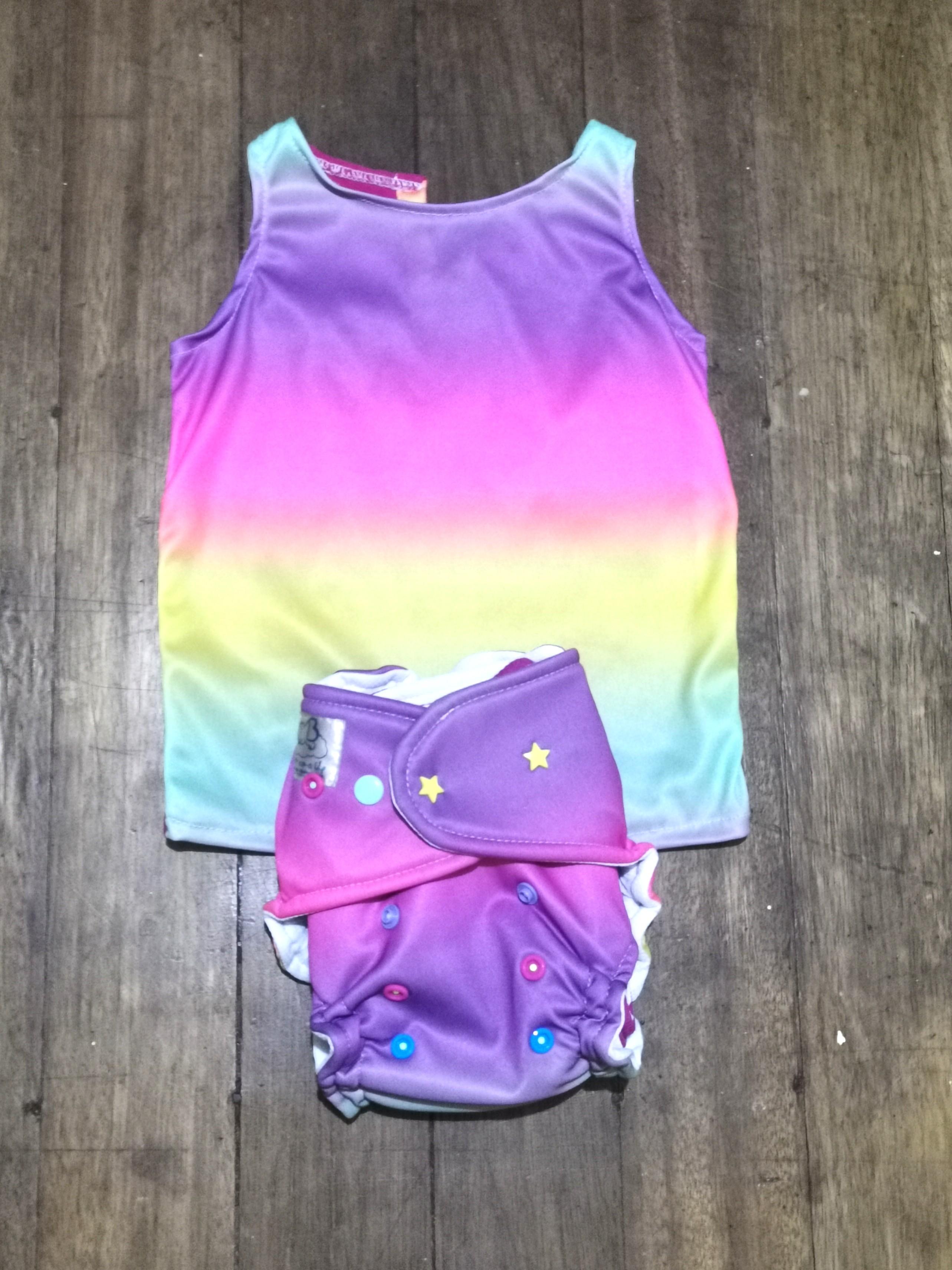 Buttoms Up Cloth Diaper with Terno Top (Category: Babies & Kids Fashion) located in San Juan City. Submitted by ababy.chill (Listing ID 1063338189, Image 1). Description: Rainbow Buttoms Up Cloth Diaper with Terno Top.