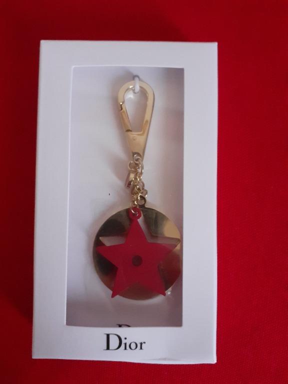 Christian Dior Charm Keychain (Category: Luxury Accessories) located in Paranaque City. Submitted by donjuan_thegreat (Listing ID 1063532754, Image 2). Description: Item is brand new Comes with original box Opened for pictorial purposes Material: Metal Dimensions: Total Length 8.5 cm Diameter 3 cm With 9 cards in different languages For pick-up in UPS 5 Paranaque or can ship at buyers expense .
