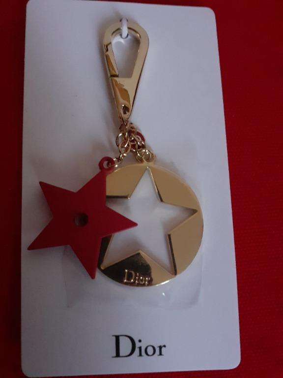 Christian Dior Charm Keychain (Category: Luxury Accessories) located in Paranaque City. Submitted by donjuan_thegreat (Listing ID 1063532754, Image 1). Description: Item is brand new Comes with original box Opened for pictorial purposes Material: Metal Dimensions: Total Length 8.5 cm Diameter 3 cm With 9 cards in different languages For pick-up in UPS 5 Paranaque or can ship at buyers expense .