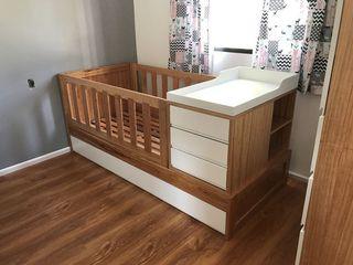 Crib with diaper changing station,drawers and pullout bed