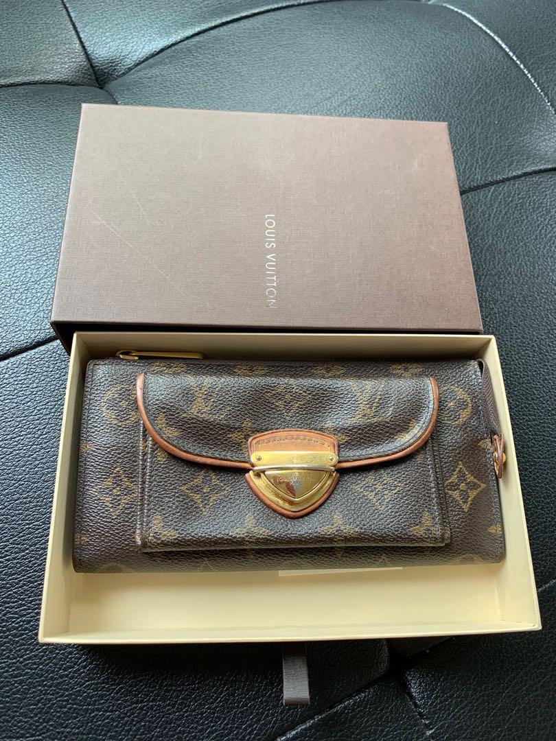 Sold at Auction: LOUIS VUITTON ASTRID WALLET