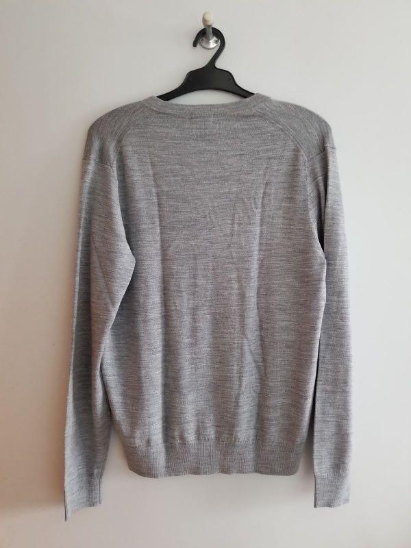 Uniqlo men cardigan (Category: Coats, Jackets and Outerwear) located in Quezon City. Submitted by cyustore (Listing ID 1063368560, Image 3). Description: Never worn Good as new Closet cleaning.