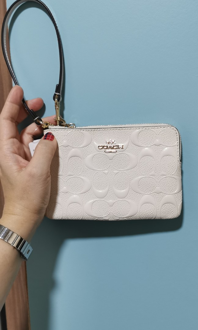 white coach wristlet