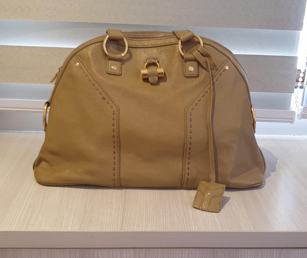 YSL Muse Large - Beige (Category: Luxury Bags & Wallets) located in Makati City. Submitted by annaabs (Listing ID 1063295520, Image 1). Description: - Preloved leather bag - As per Dr Leather, minor repairs on handles with minor charges - selling low - Complete with dustbag, authentication card, receipt, and tag.