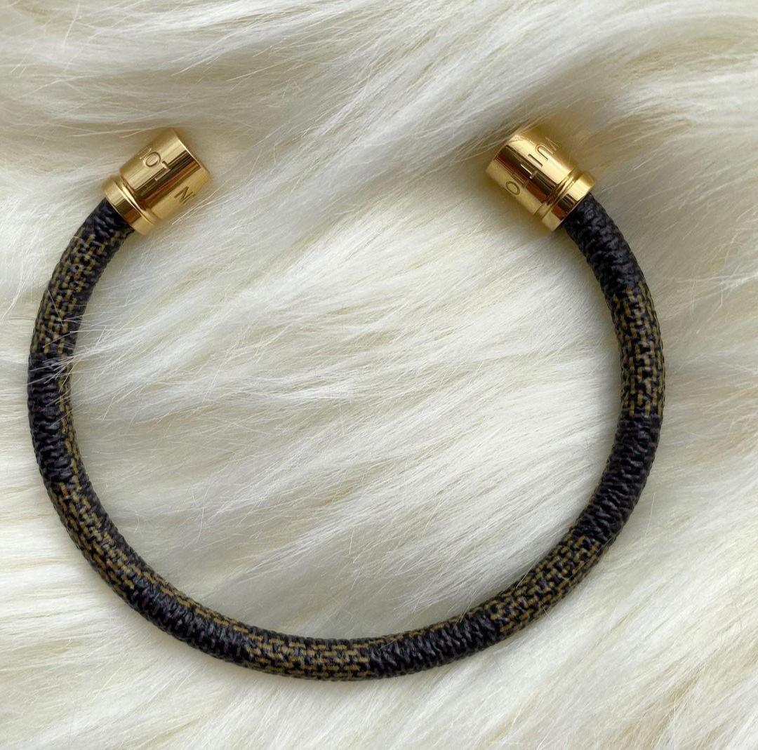 Louis Vuitton Gold & Leather Magnetic Bracelet, Luxury