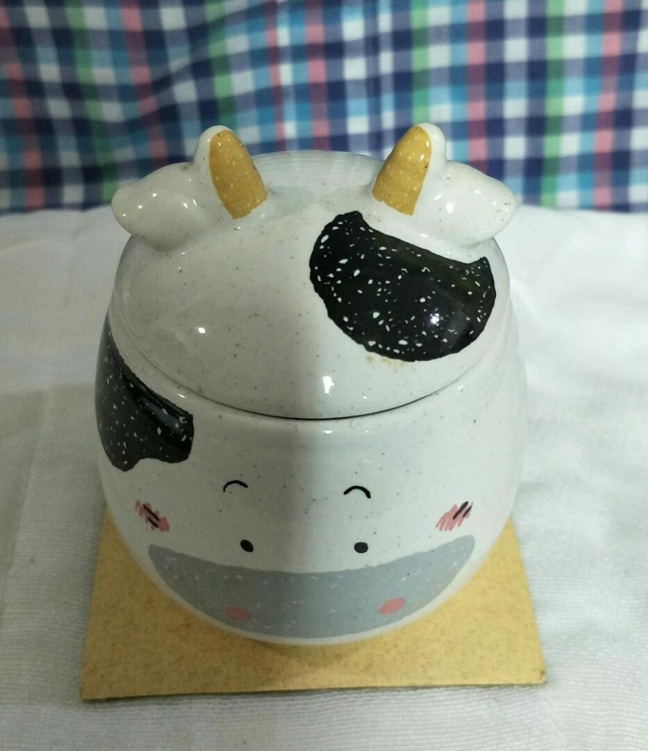 Small Cow Pot with Lid (Category: Food Organization & Storage) located in Paranaque City. Submitted by trinkets_by_joy (Listing ID 1063890445, Image 3). Description: small ceramic jar removable lid "cow" design not airtight for measurements refer to photos can be used in kitchen or for trinkets inquire now!!!.