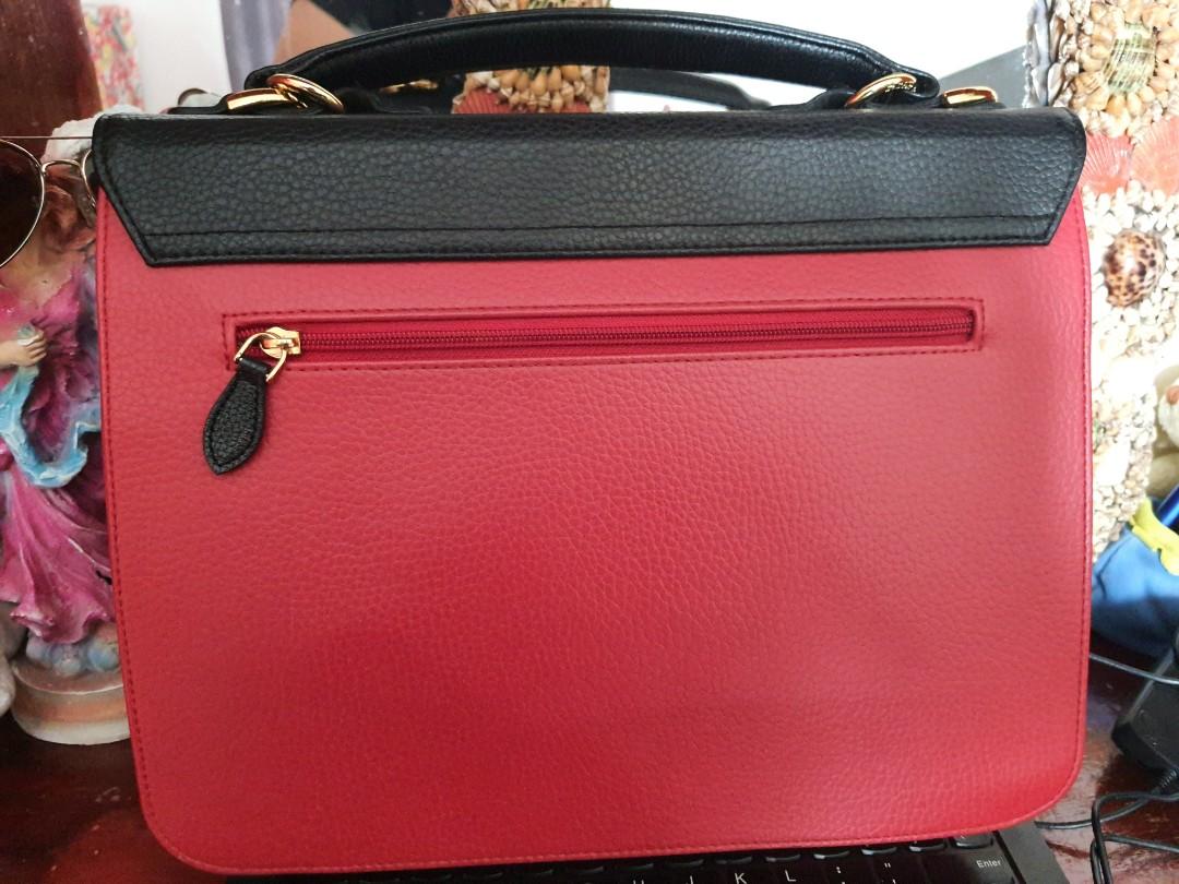 st.scott London 2 way bag (Category: Luxury Bags & Wallets) located in Manila. Submitted by bag_collections (Listing ID 1063861371, Image 2). Description: Selling my preloved St. Scott London 2 way Bag Sobrang nice looks almost new combination of black and red soft leather medium size bag as in sobrang ganda..