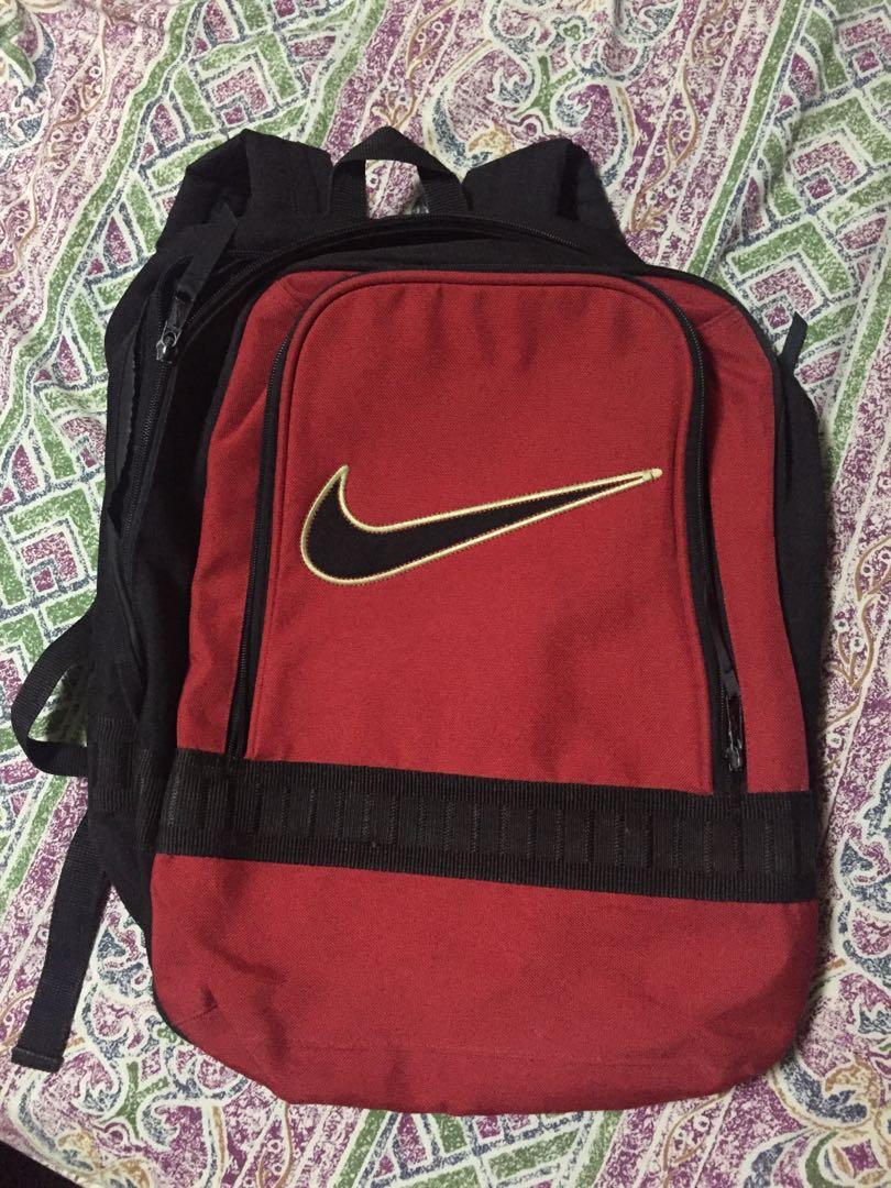 red and black nike backpack