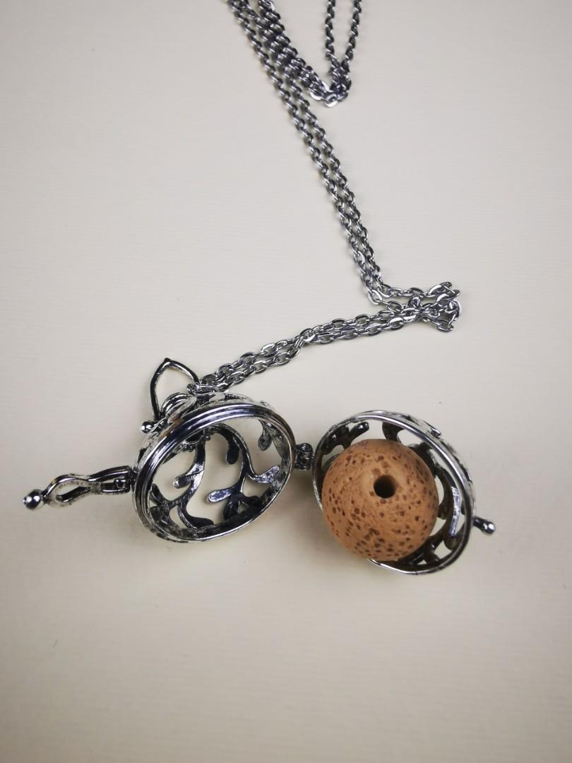Necklace Diffuser (Category: Purses & Pouches) located in Singapore. Submitted by michbai (Listing ID 1059966204, Image 3). Description: Antique diffuser Necklace Locket for perfume oil or essential oil Lava ball provided to drip fragrances. Length - 35cm Pendant - 2cm diameter Limited qty available. Abai 98303659.