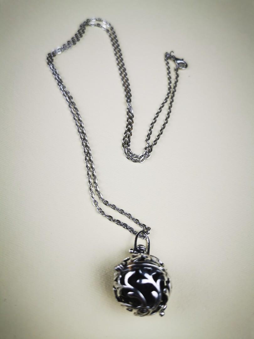 Necklace Diffuser (Category: Purses & Pouches) located in Singapore. Submitted by michbai (Listing ID 1059966204, Image 2). Description: Antique diffuser Necklace Locket for perfume oil or essential oil Lava ball provided to drip fragrances. Length - 35cm Pendant - 2cm diameter Limited qty available. Abai 98303659.