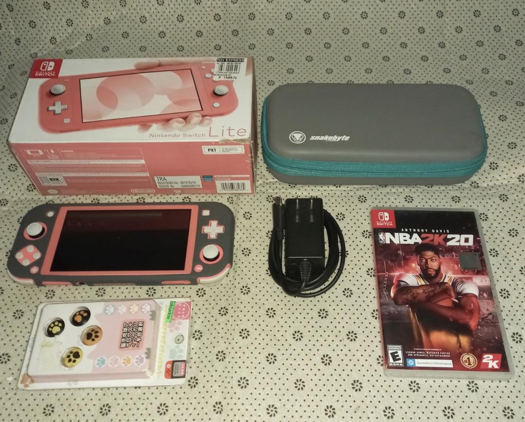 Nintendo Switch Lite Coral Pink Video Gaming Video Game Consoles Nintendo On Carousell