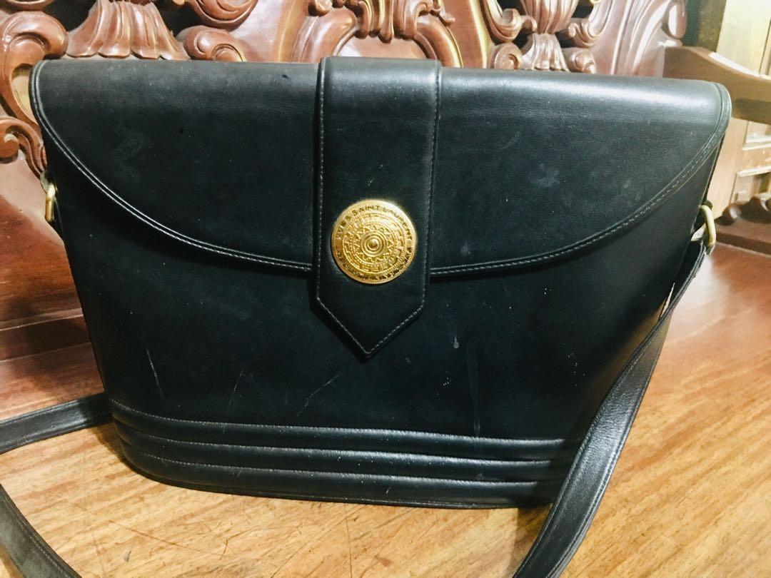 Yves Saint Laurent Vintage (Category: Luxury Bags & Wallets) located in Calauag. Submitted by jslash (Listing ID 1059984837, Image 1). Description: Vintage Yves Saint Laurent. Used but not abused. Selling because kalat nlng sa bahay. Not legit but good quality..