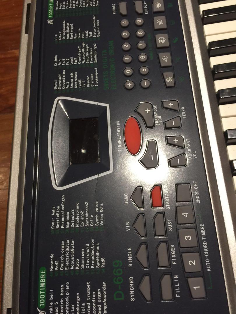 Electric Piano/Organ (DAVIS D-669) (Category: Musical Instruments) located in Cainta. Submitted by giyanseyo (Listing ID 1064170904, Image 2). Description: Davis D-669 54 keys Electric Piano/Organ with mic and charging adaptor Price: 2,750 (NEGOTIABLE) Issue: crack middle (please see images), no issue playing the piano, all keys are working fine.