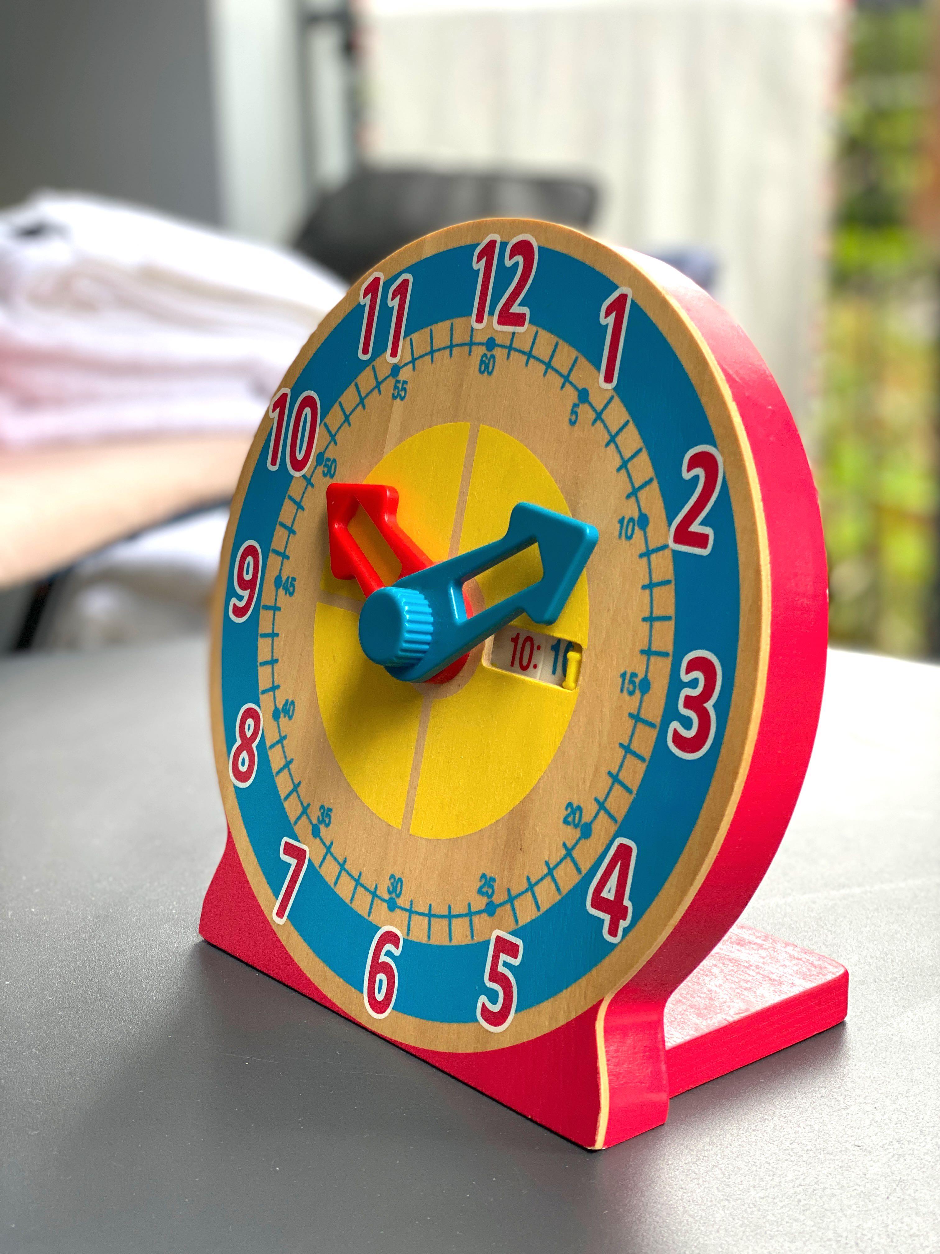 Melissa & doug turn top & tell clock