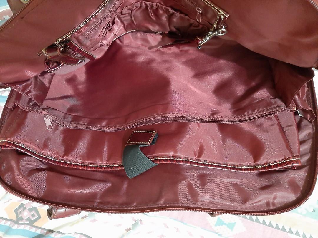 Red croc bag (Category: Cross-body Bags) located in Manila. Submitted by jamyla (Listing ID 1064174571, Image 3). Description: with laptop compartment.