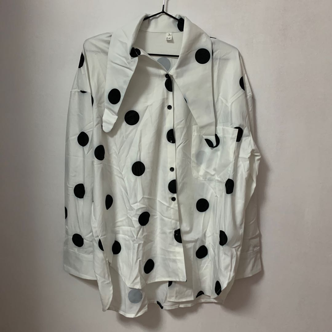 grey blouse with white polka dots