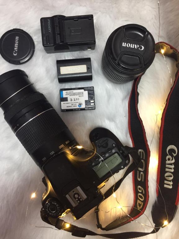 CANON 60D DSLR Camera w/ two free lens (Category: Voice Recorders) located in Makati City. Submitted by ebolet (Listing ID 1064400419, Image 1). Description: Canon 60D DSLR Camera 9/10 condition. No fungus, clean lens, flash are working. Barely Used Inclusions: - 70-300mm zoom lens - 18-55 kit lens - 1 extra battery (2 batteries) - 1 charger - 1 strap Flaws: loose metal in zoom lens. But still functions perfectly and doesn't affect photo or video