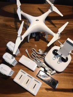 DJI Phantom 4 Pro with 3 batteries and a charging dock