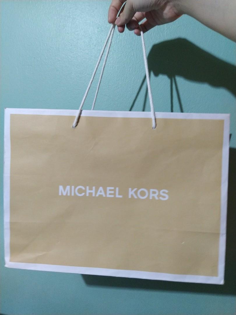 Michael kors paper bag, Women's Fashion, Bags & Wallets, Purses & Pouches  on Carousell
