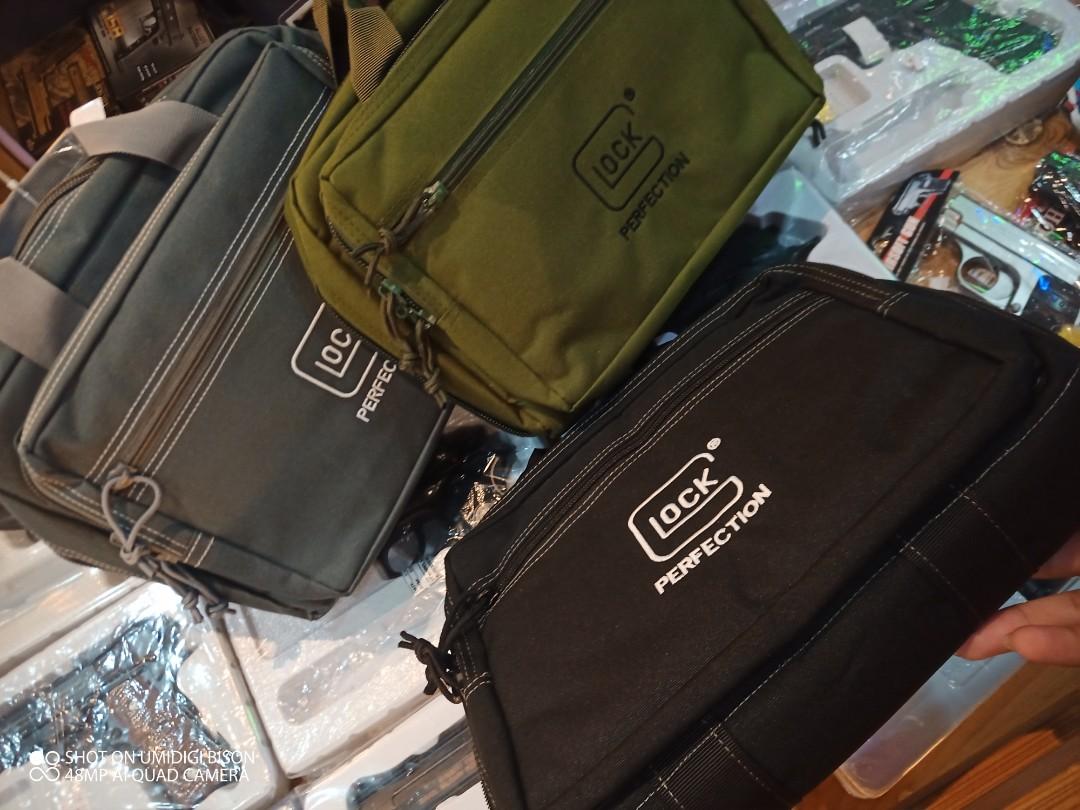 PISTOL/EDC BAGS (Category: Sling Bags) located in Makati City. Submitted by hellohoooman (Listing ID 1064386538, Image 2). Description: Good Quality Padded Fabric Has different compartments for your edc..